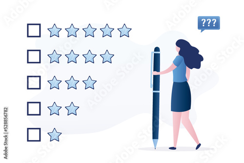 hinking businesswoman holds pen to review and giving stars quality result. Evaluation or satisfaction feedback, performance rating or customer review, rate service. photo