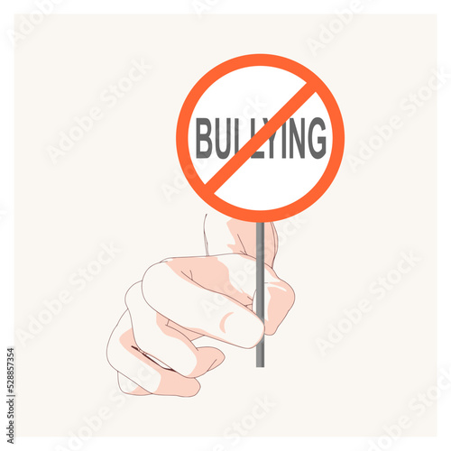 Hand Holding Stop Bullying Road Sign. Stop Bullying and Child Abuse in the School. Verbal, Social, Physical and Cyberbullying concept.
