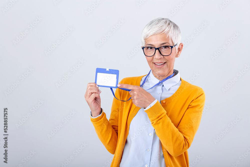 Woman wear blank vertical ID badge mockup, stand isolated. Name tag on neck and chest. Person identity label. Women in shirt uniform with empty id card mock up. Bussinesswoman lanyard design. Woman wear blank vertical ID badge mockup, stand isolated. Name tag on neck and chest. Person identity label. Women in shirt uniform with empty id card mock up. Bussinesswoman lanyard design.