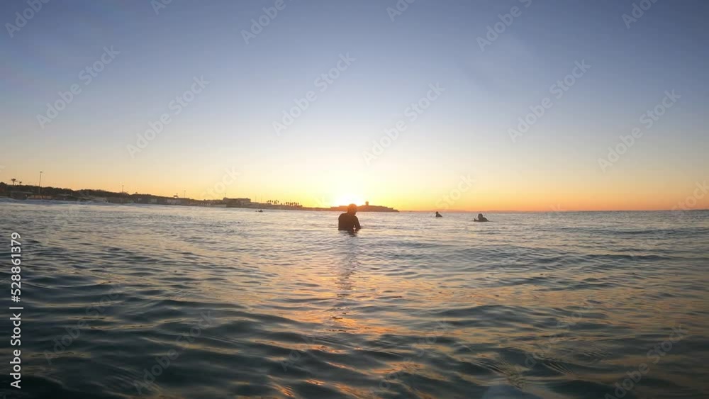 Famous, beautiful beach at sunset with calm sea near fort of saint Julian in Carcavelos, in summer very popular, sandy coast have a fantastic view of friendship and amazing sunrise. Portugal Famous, beautiful beach at sunset with calm sea near fort of saint Julian in Carcavelos, in summer very popular, sandy coast have a fantastic view of friendship and amazing sunrise. Portugal