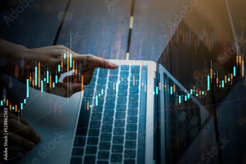 Double exposure of Stock market or forex trading graph for financial investment concept. Economy trends background for business idea and all art work design. Abstract finance background.