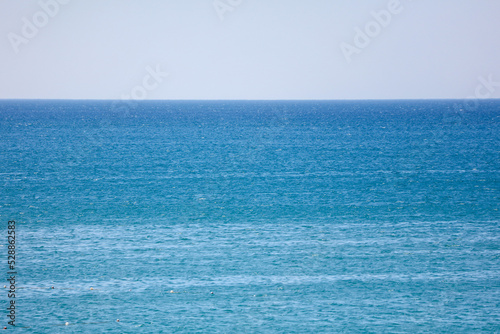 Skyline with blue water in the sea