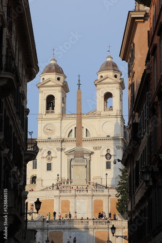 Trinità dei Monti Church and Spanish Steps View from Via Condotti Street in Rome, Italy