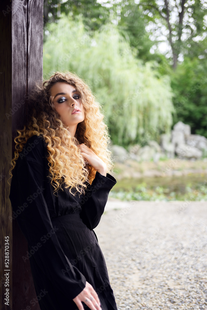 Portrait of young beautiful woman. Natural light. Shallow depth of field. Portrait of young beautiful woman. Natural light. Shallow depth of field.