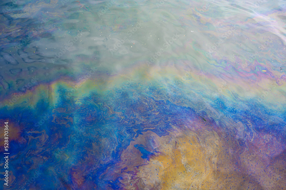 Oil spill on sea surface. Pollution in the water.