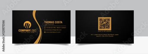 Luxury and elegant black gold business cards template on black background.