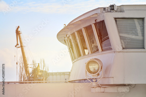 Ship bridge of captain exterior, room of able seaman for ship control by helmsmen photo