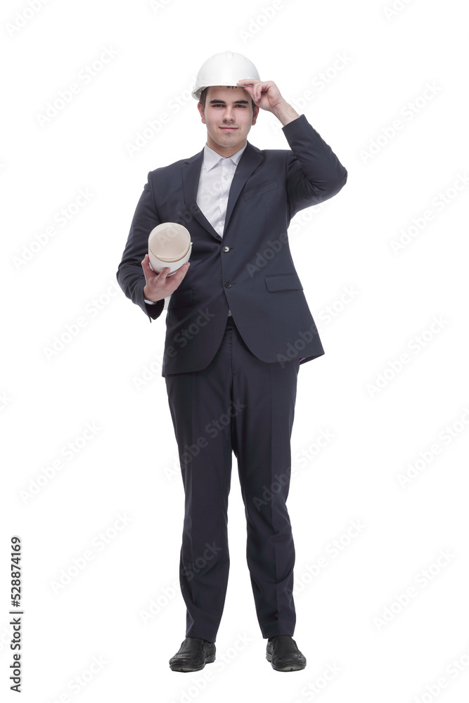 Front view of young architect man in hardhat holding blueprints walking away Front view of young architect man in hardhat holding blueprints walking away