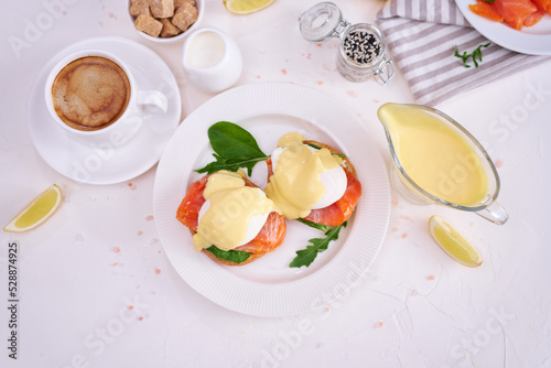 Eggs Benedict with Cream cheese and Smoked salmon on a plate