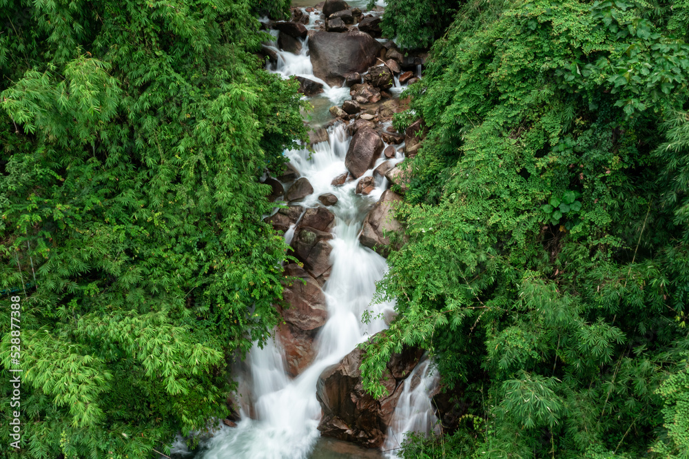 beautiful nature landscape krating waterfall in the rainy season and refreshing greenery forest in the national park of khoa khitchakut chanthaburi province thailand. aerial view