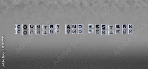 country and western word or concept represented by black and white letter cubes on a grey horizon background stretching to infinity