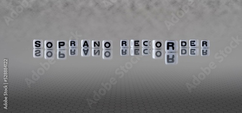 soprano recorder word or concept represented by black and white letter cubes on a grey horizon background stretching to infinity