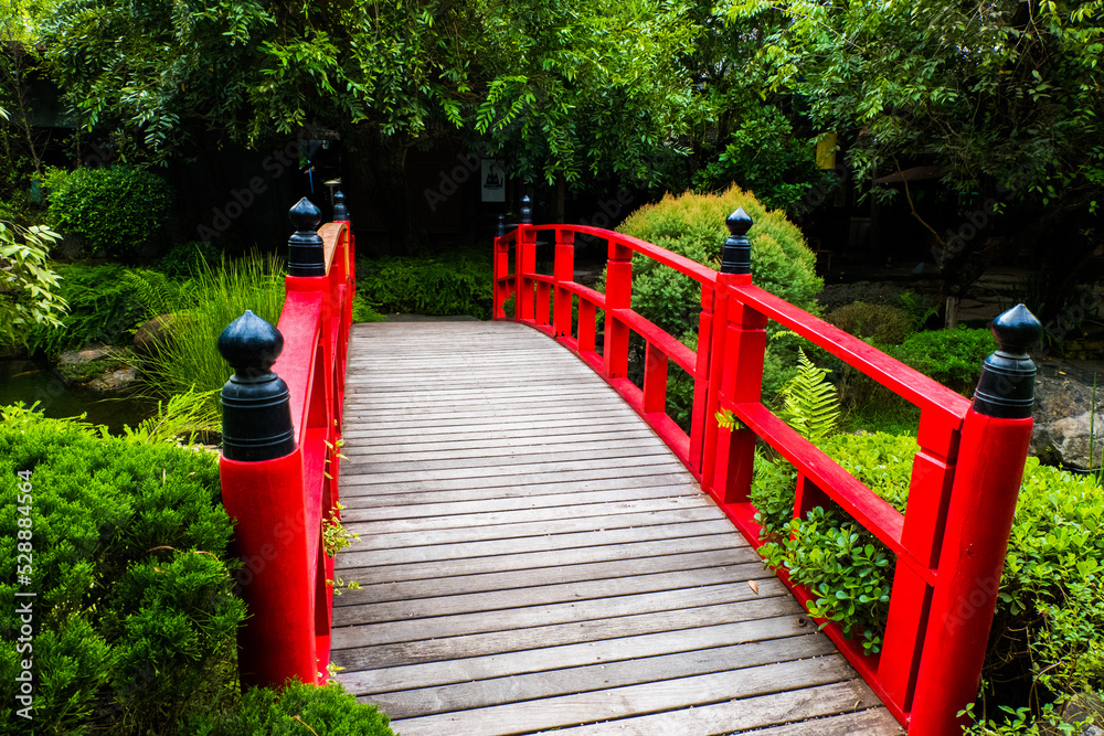 Red wooden bridge at the Japanese Garden. Red wooden bridge at the Japanese Garden.