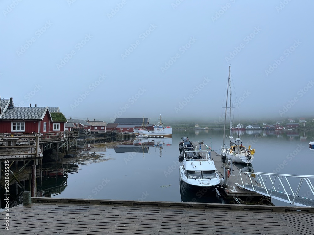 Fototapeta premium Boats pier in the fog, misty seascape