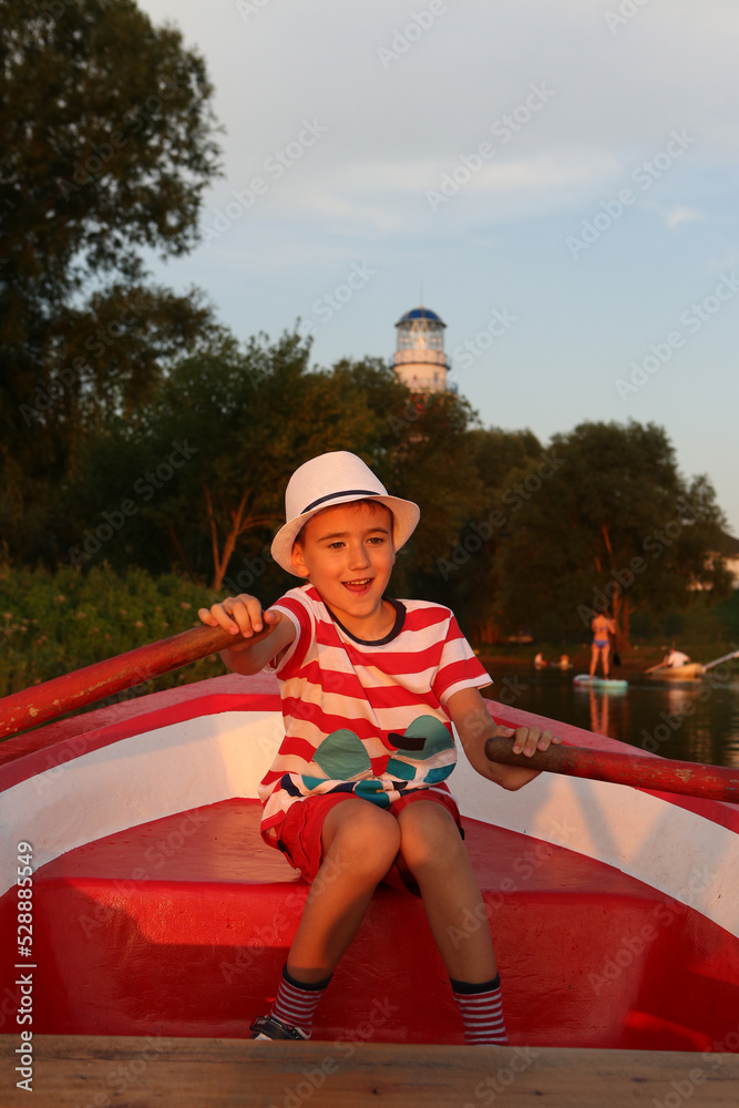 Happy russian tourist child, fashion kid. Water sport, active rest ...