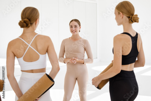 Cheerful group of athletic women having fun together