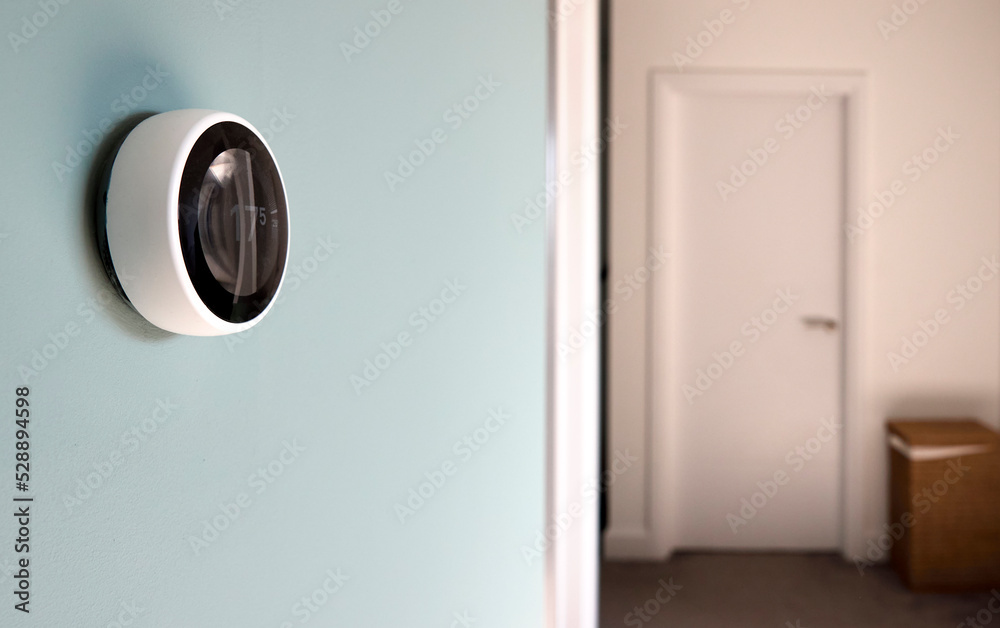 Smart Heating Control On Wall Of Modern Home Smart Heating Control On Wall Of Modern Home