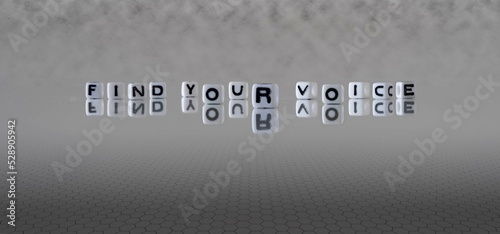find your voice word or concept represented by black and white letter cubes on a grey horizon background stretching to infinity