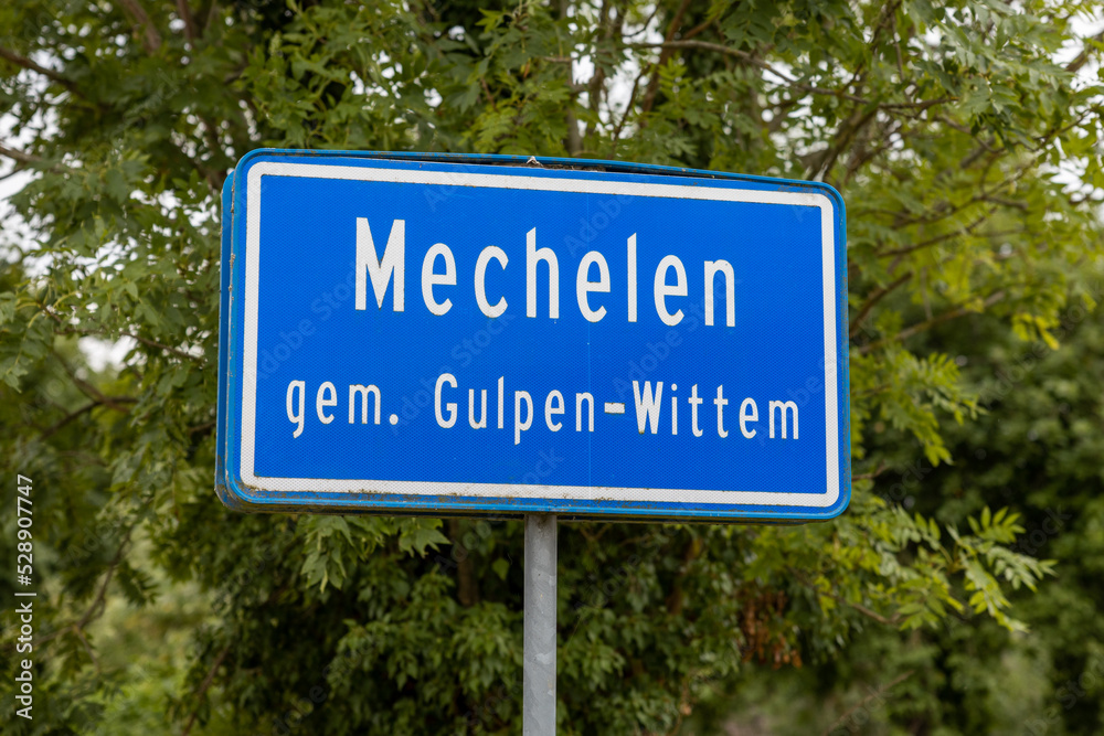 Dutch place name sign of the village of Mechelen in the municipality of Gulpen-Wittem Dutch place name sign of the village of Mechelen in the municipality of Gulpen-Wittem