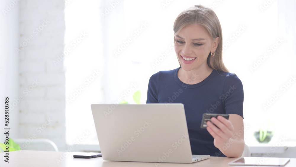 Woman making Successful Online Payment on Laptop Woman making Successful Online Payment on Laptop