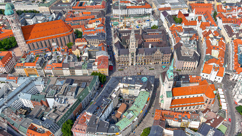 Aerial view of Munich, Germany. Flying above Altstadt (Old Town) and Frauenkirche church. Central Marienplatz square contains landmarks such as Neo-Gothic Neues Rathaus (New Town Hall) in Bavaria.