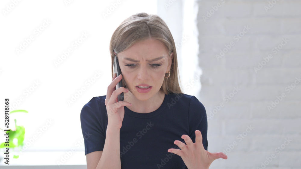 Portrait of Woman Talking Angrily on Smartphone Portrait of Woman Talking Angrily on Smartphone