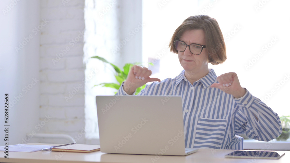 Senior Woman Reacting to Loss While using Laptop Senior Woman Reacting to Loss While using Laptop