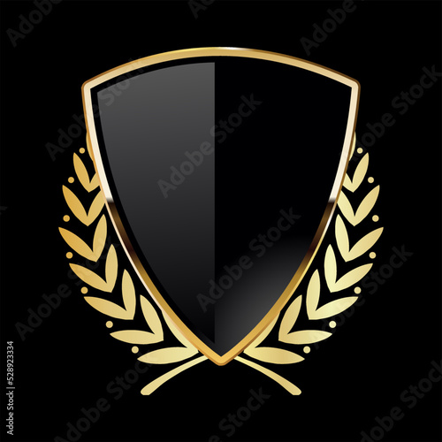 Black shield with golden laurel wreath on black background  