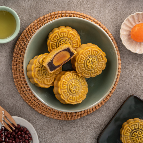 Delicious Cantonese moon cake for Mid-Autumn Festival food mooncake on gray table background.