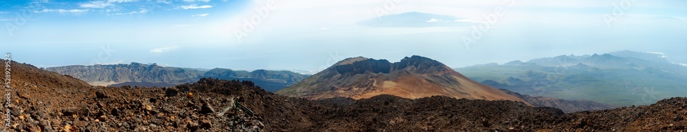Pico Viejo volcano where the island of La Gomera can be seen in the background, image taken from a viewpoint on Teide, Tenerife, Spain.