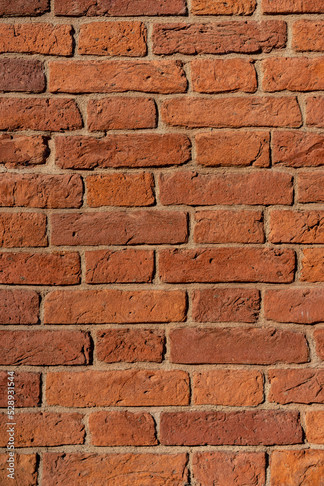 Empty brick red wall. background of a old brick house. Empty brick red wall. background of a old brick house.