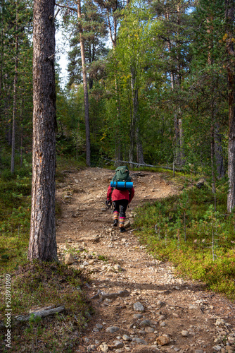 Woman hiking in Lapland Finland