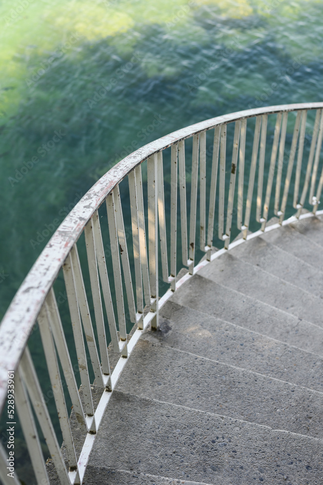 close up of stairway leading into water at Lake Constance in Germany close up of stairway leading into water at Lake Constance in Germany