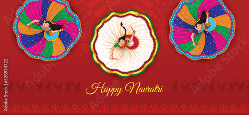 Dancing Dandiya couple at Navratri, Happy Durga Puja and Dussehra