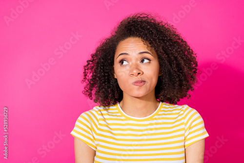 Closeup photo of young adorable pretty nice girl shy pouted lips shy look empty space dreamy shopping sale isolated on pink color background © deagreez