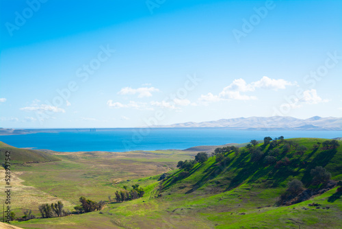 San Luis Obispo reservoir under a blue sky photo
