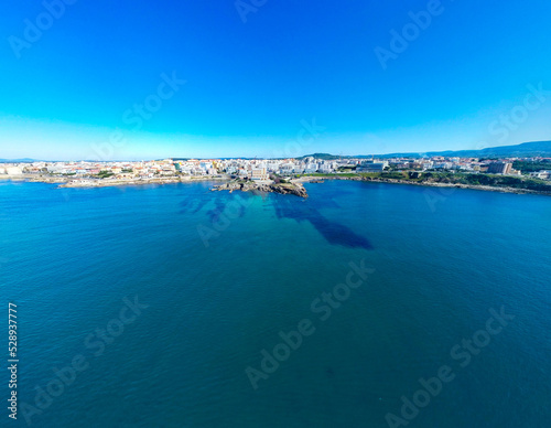 Fototapeta Naklejka Na Ścianę i Meble -  Aerial view of Alghero seafront on a sunny day in springtime