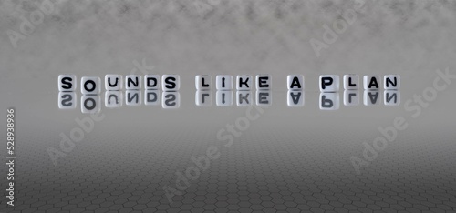 sounds like a plan word or concept represented by black and white letter cubes on a grey horizon background stretching to infinity