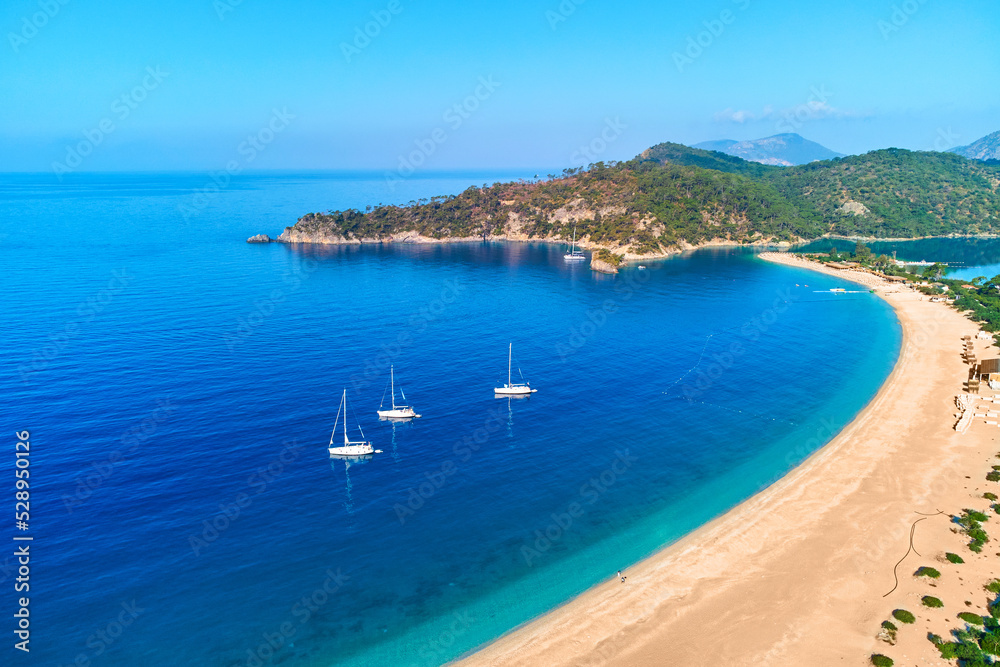 Drone photo of sailing yachts in the mediterranean azure sea