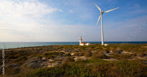 Polente Lighthouse is located at the westernmost edge of Bozcaada and was built in 1861. Polente light is 32 meters high and can send its light up to 15 nautical miles or 28 kilometers. photo