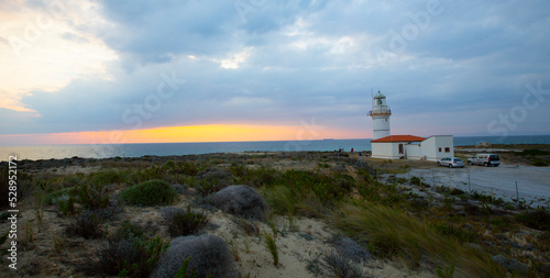 Polente Lighthouse is located at the westernmost edge of Bozcaada and was built in 1861. Polente light is 32 meters high and can send its light up to 15 nautical miles or 28 kilometers. photo