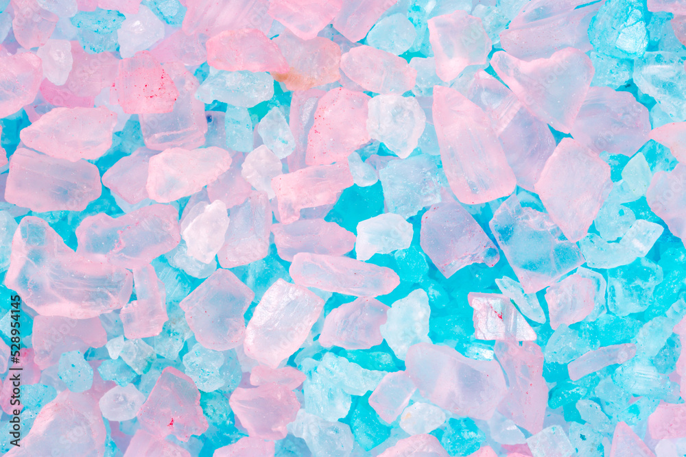 Obraz premium Salt crystals, sea salt as background and texture. Ice crystals Blue and pink