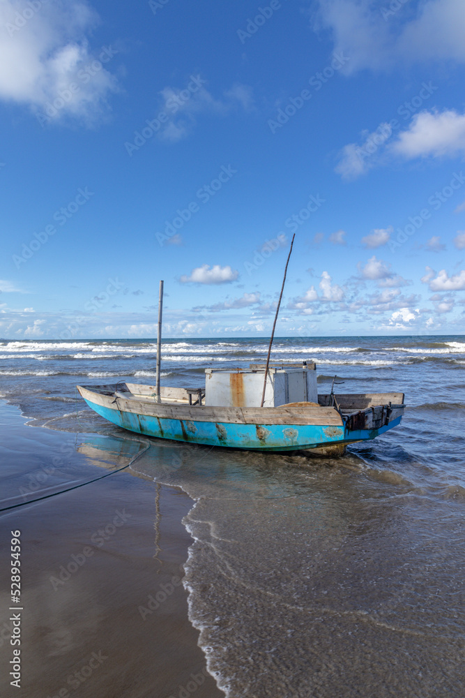 boat on the beach in the city of Ilheus, State of Bahia, Brazil