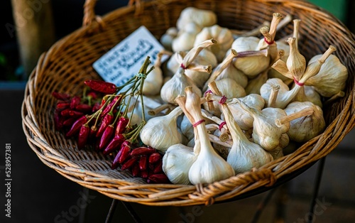 Red chili and garlic in basket displayed at famous marketplace Viktualienmarkt, Munich, Germany photo