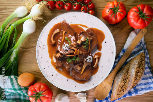 Fricando veal. Traditional Barcelona tapas cooked with a very fine fillet of high-quality beef and mushroom sauce.