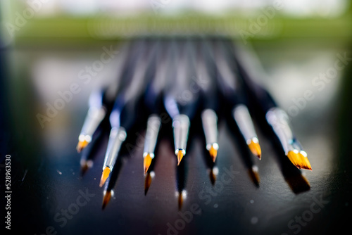 close up set of brushes for painting models and miniatures