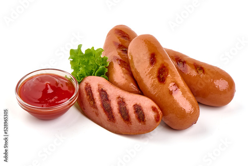 Fried sausages with tomato sauce, isolated on white background.