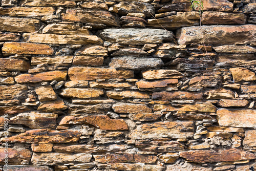 Old stone wall forming a texture in the State of Minas Gerais, Brazil.