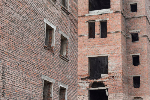 abandoned and destroyed red brick buildings