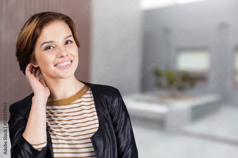 Happy student girl posing on the background. Happy student girl posing on the background.